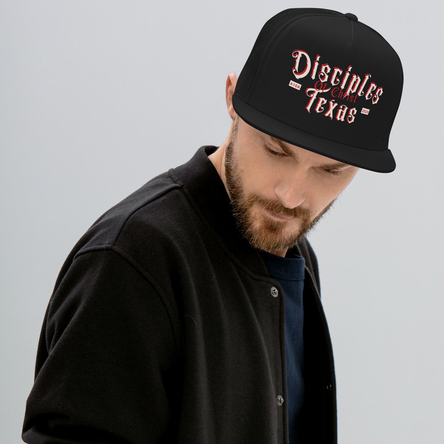 Man wearing the Disciples of Christ black Christian Trucker Cap by ANGELS 10 APPAREL LLC; a trendy choice for Christian Veterans and those who love Christian Apparel.