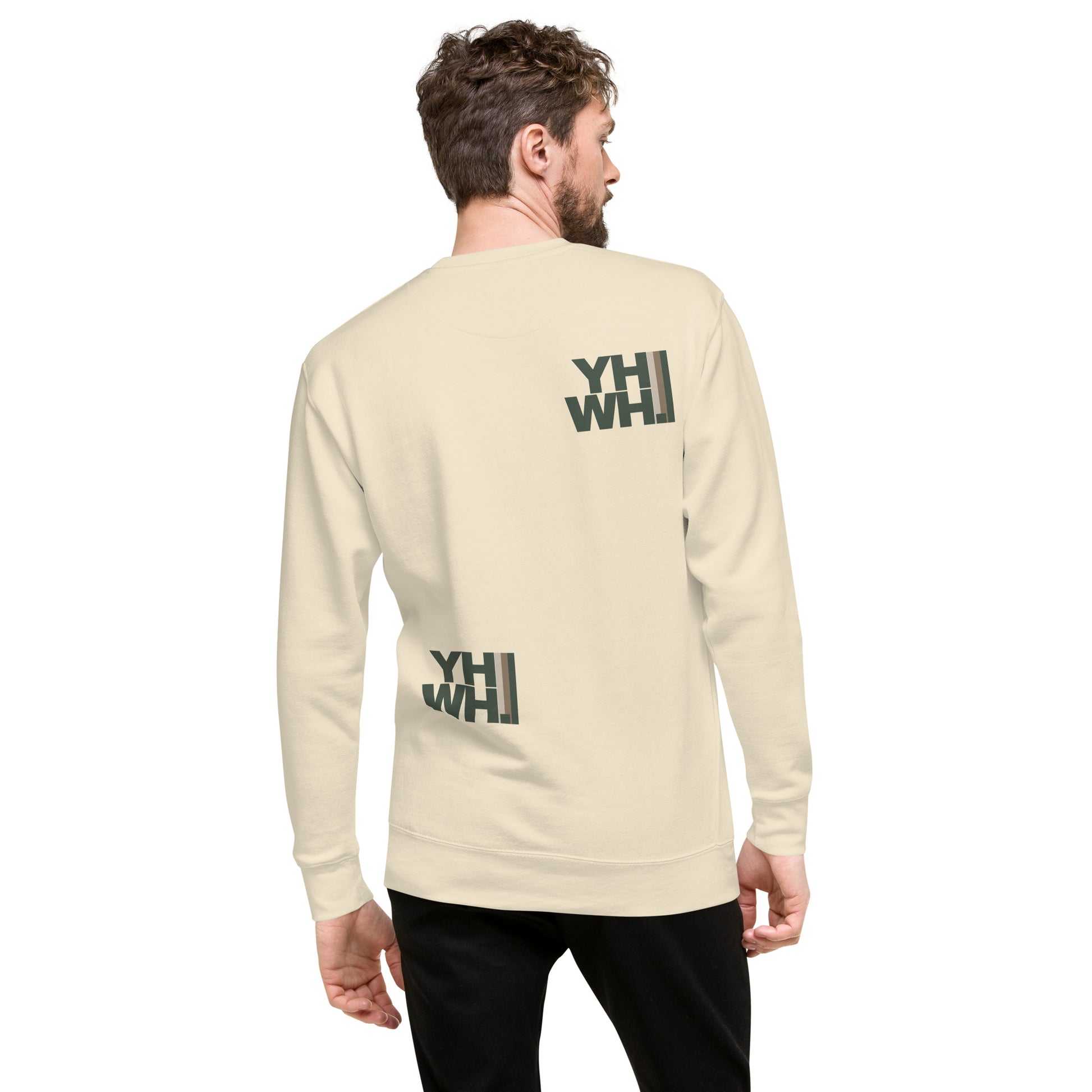 Man in a relaxed fit Unisex YHWH Premium Sweatshirt, highlighting the modern back design. Ideal for layering and representing your christian values while styling from a veteran-owned small business.