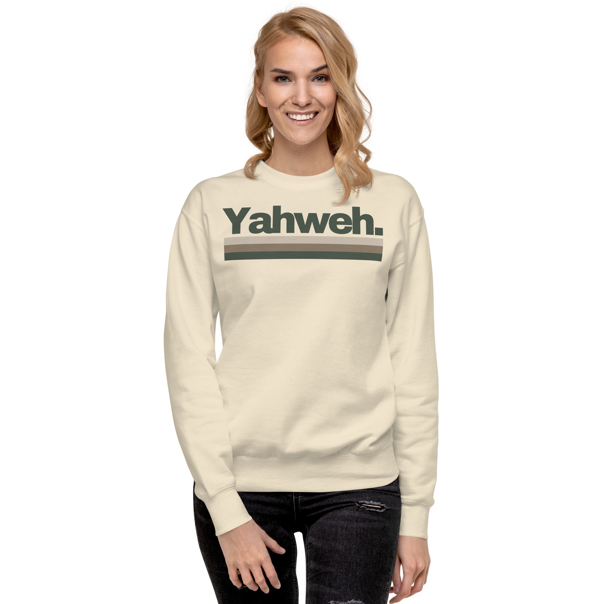 Smiling woman wearing the front view of the Unisex YHWH Premium Sweatshirt, featuring the printed 'Yahweh.' This sweatshirt combines comfort with faith-driven style from a veteran-owned small business.