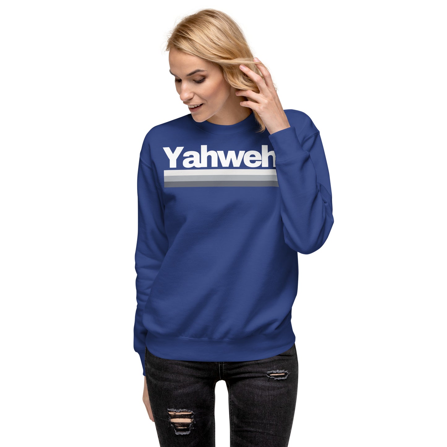 Woman wearing YHWH Unisex Premium Crewneck Sweatshirt in blue, showcasing a blend of comfort and style. A great choice for anyone who values faith. Support this veteran-owned small business.